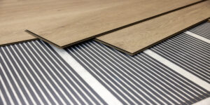 can electric underfloor heating go under carpet