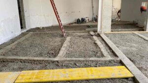 do i need to screed a concrete floor for tiles